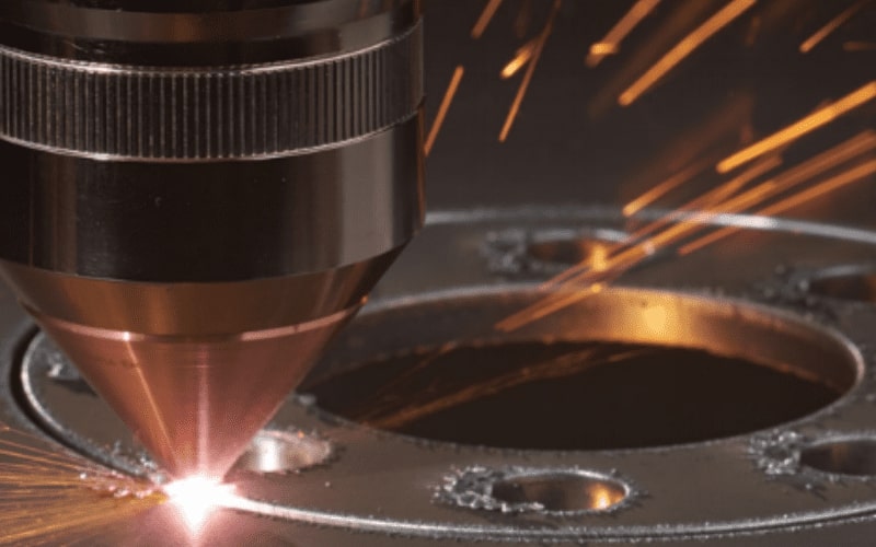 Hypertherm True Hole technology producing cylindrical bolt-ready holes on thick steel plate