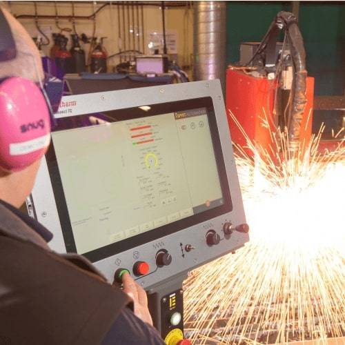Esprit CNC plasma cutting machine undergoing heavy steel plate cut verification
