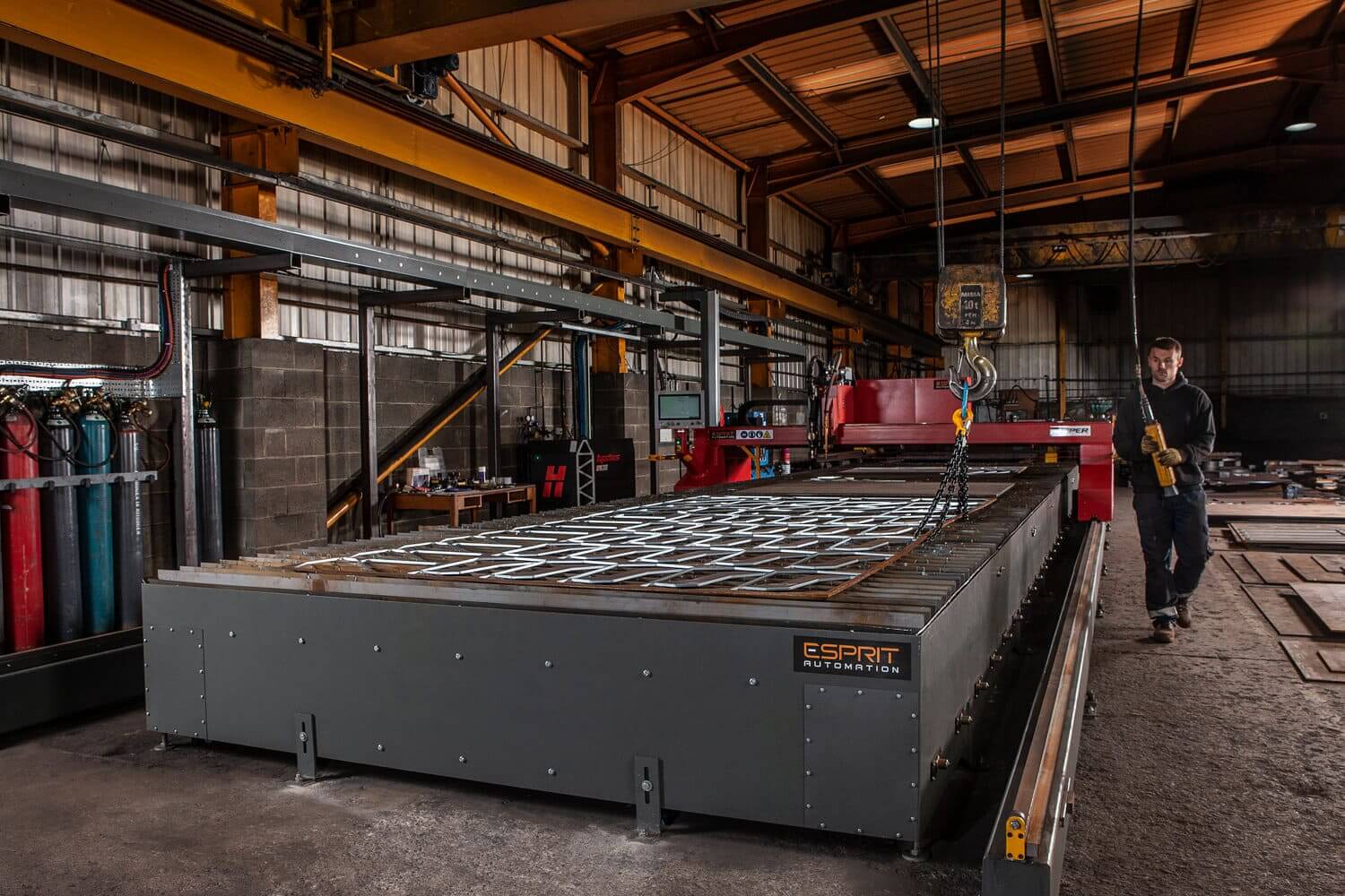 Esprit Automation CNC plasma cutting machine in active workshop production