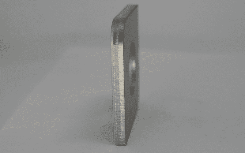 Fiber laser cut sample showing high edge squareness and minimal roughness